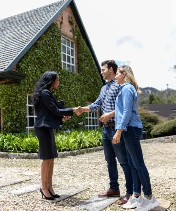 Altura agent welcoming clients at a home